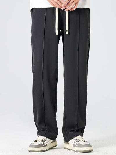 Spodnie proste z pojedynczym zakładką i sznurkiem