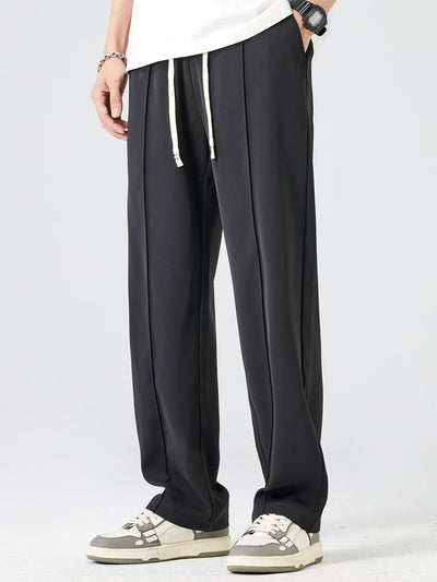 Spodnie proste z pojedynczym zakładką i sznurkiem