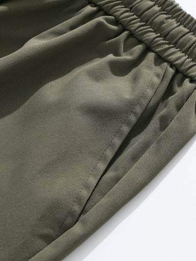 Spodnie cargo z troczkami