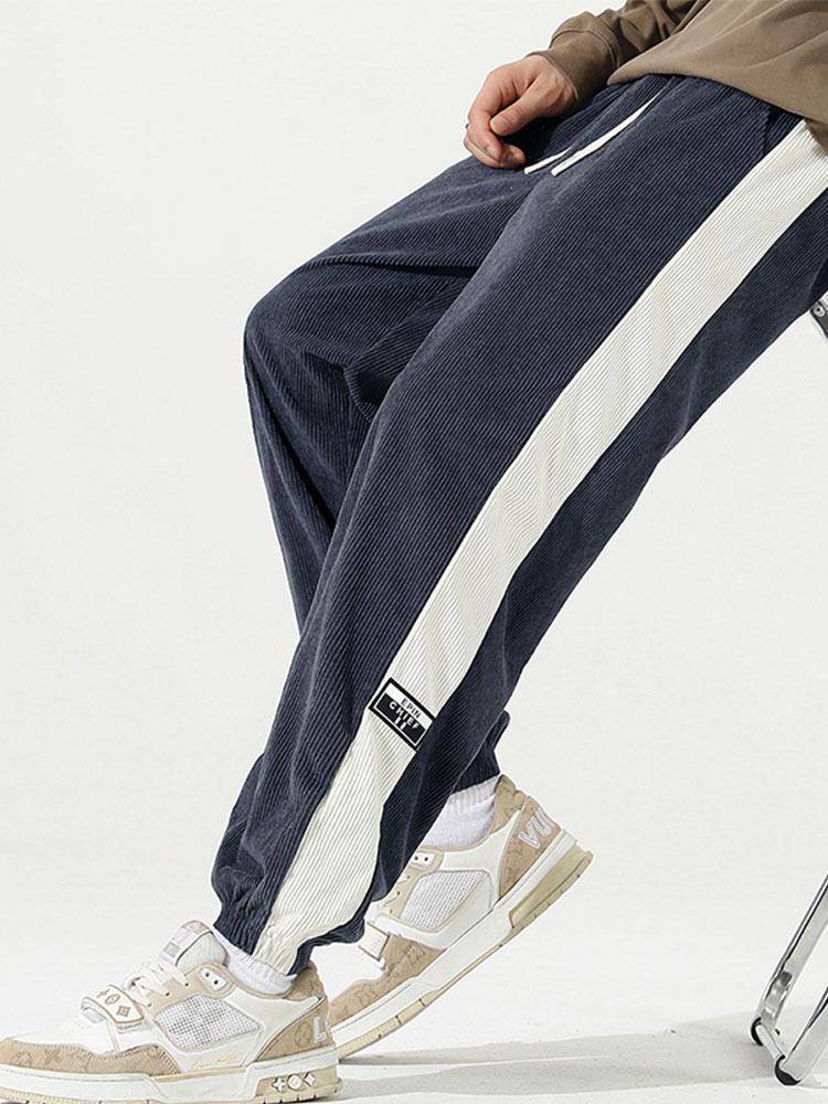 Spodnie dresowe z paskiem po bokach z korduroy