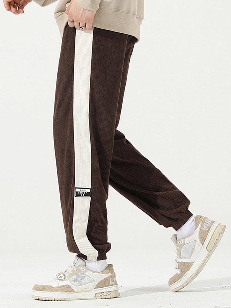 Spodnie dresowe z paskiem po bokach z korduroy